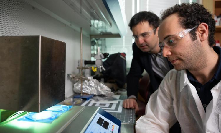 Fatih Sarioglu and Mert Boya in the lab
