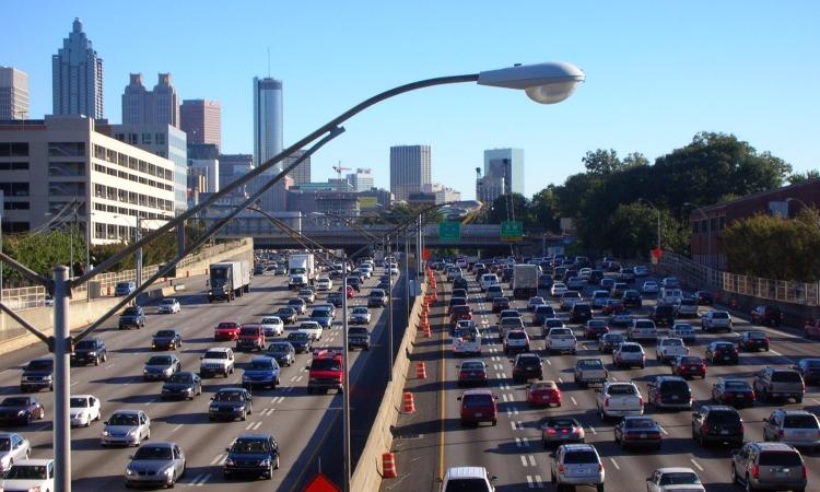 The I-75/-I85 Downtown Connector in Atlanta crowded with vehicles.