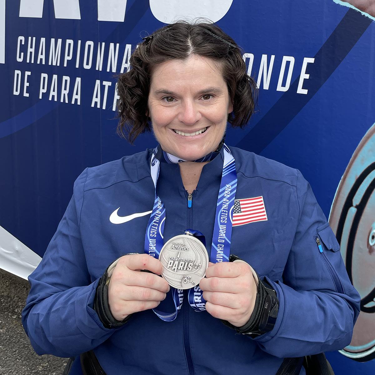 Cassie Mitchell with the silver medal she won in F51-52-53 discus at the World Para Athletics Championships. (Photo Courtesy: Cassie Mitchell)