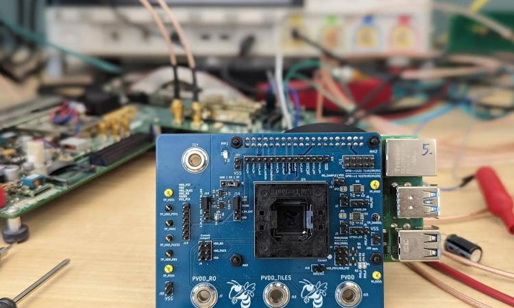 The final chip created by the student groups in ECE 4804 embedded in a printed circuit board.