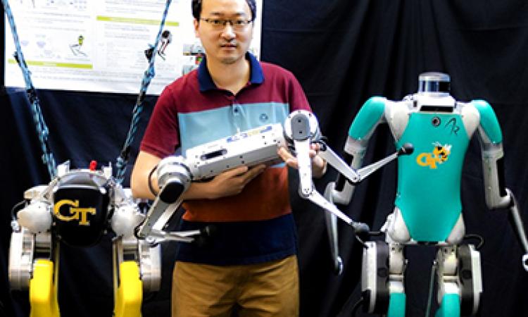 Ye Zhao with robots