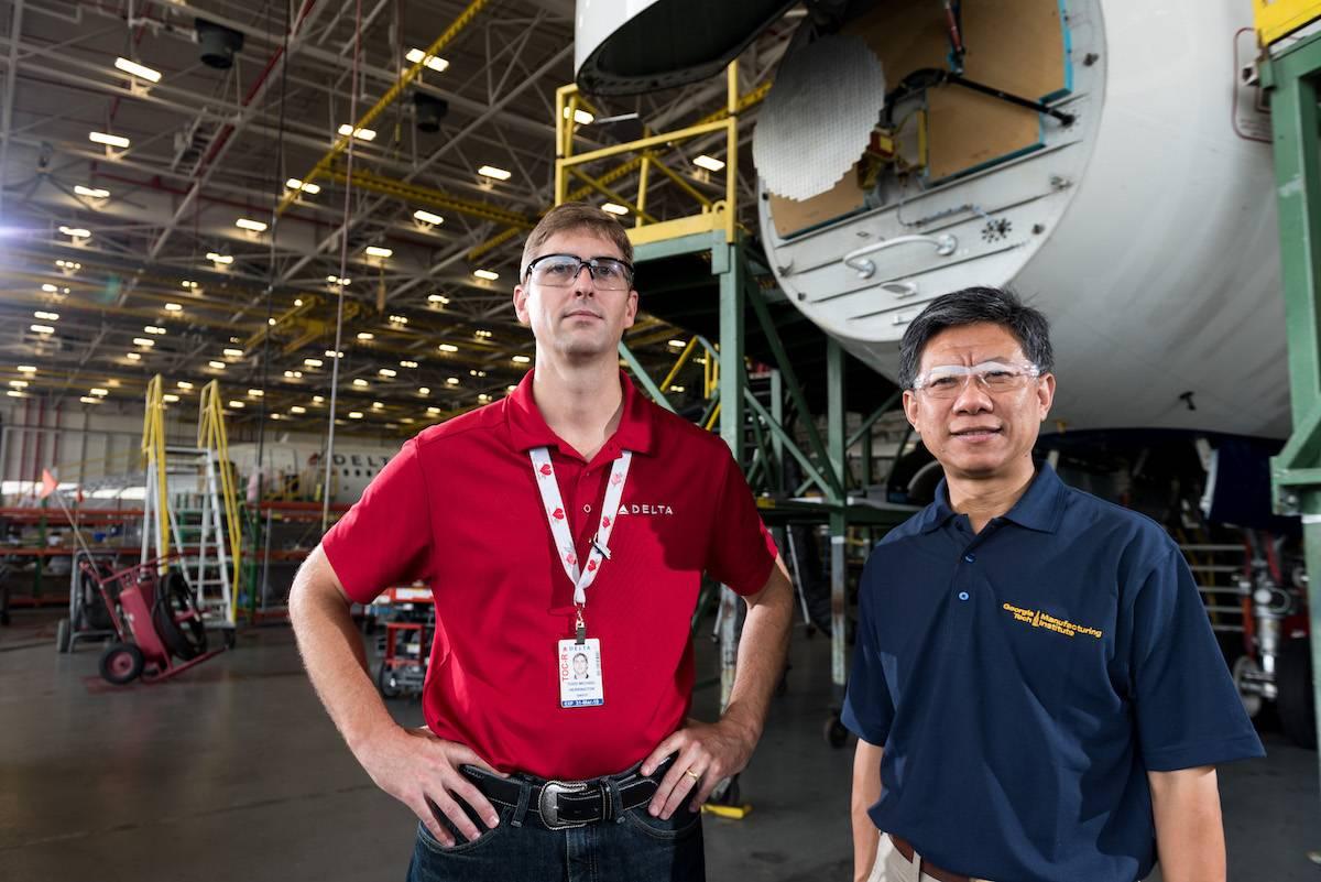 Todd Herrington, general manager of fleet projects at the company, and Chuck Zhang, a professor in Georgia Tech's Stewart School of Industrial and Systems Engineering.