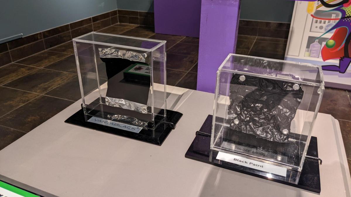 museum display with aluminum and Vantablack