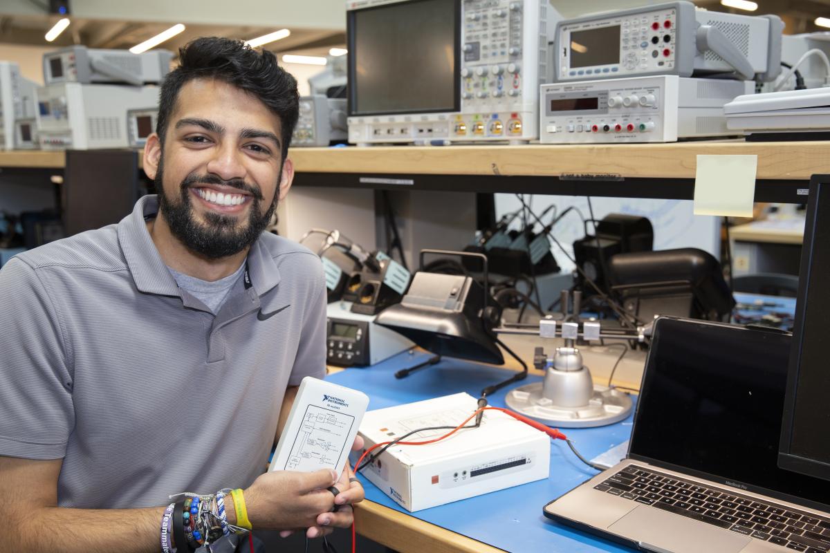 A student at a benchtop workstation