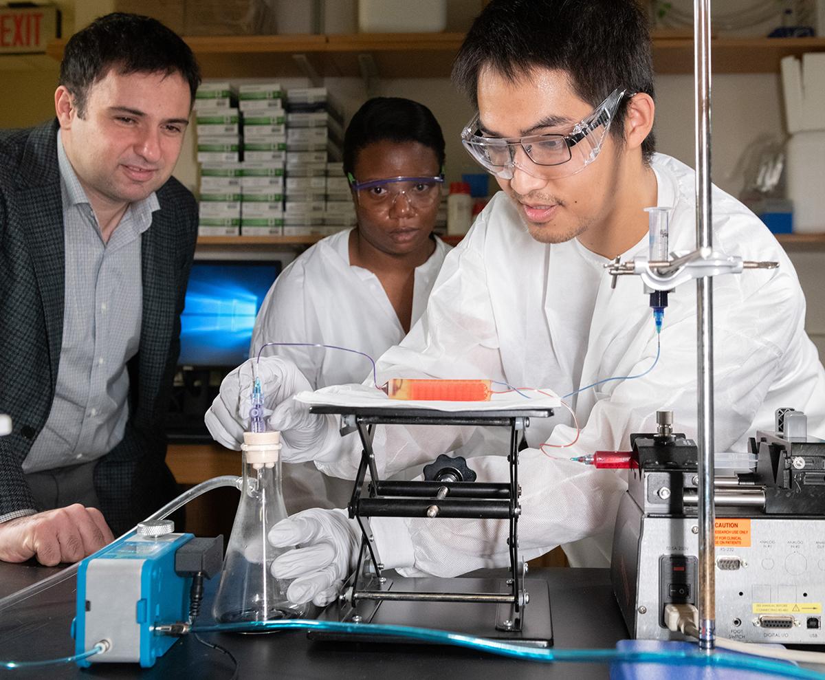 ECE Professor Fatih Sarioglu and researchers work on a 3D-printed cell trap that captures tumor cells from diagnostic blood samples.